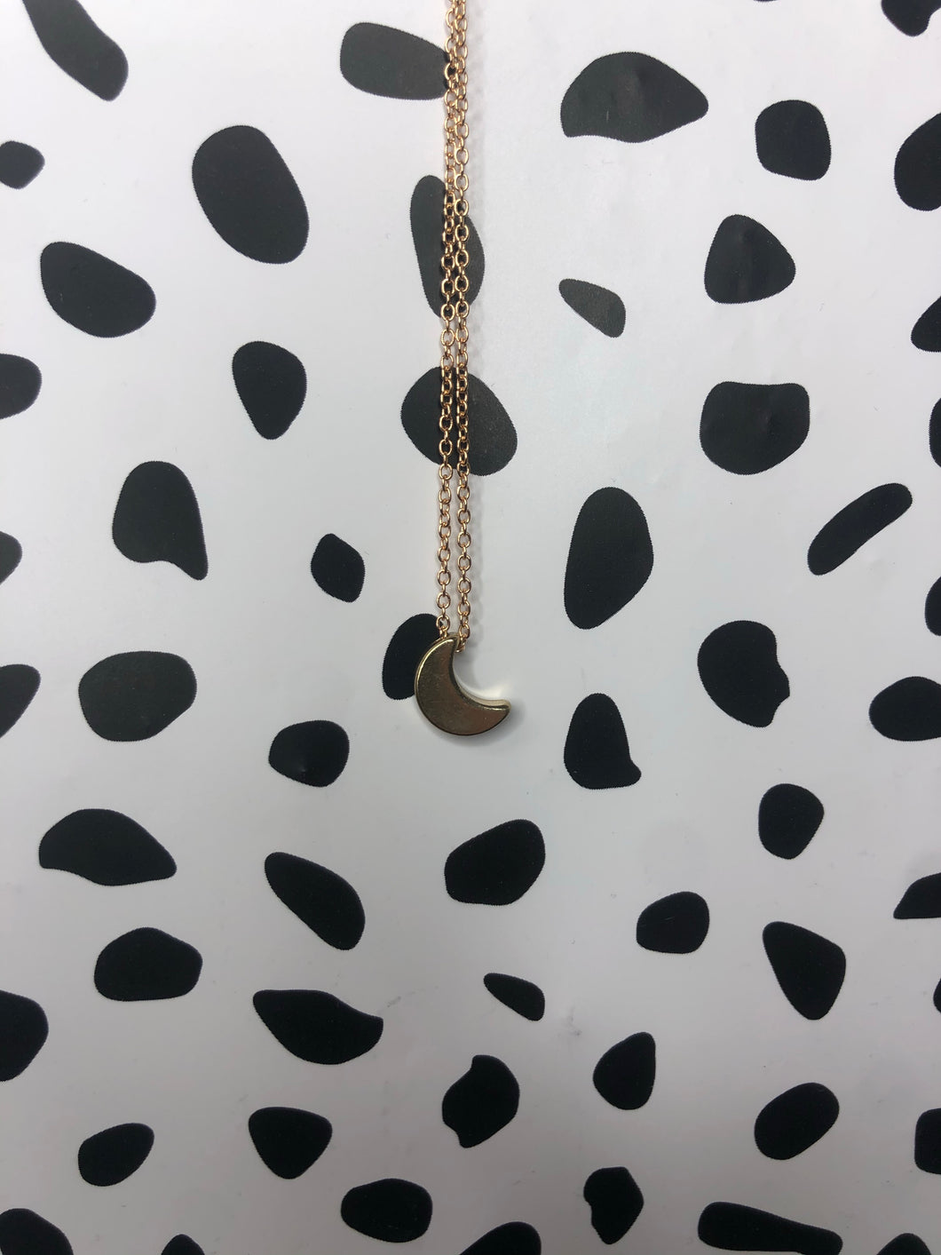 Gold moon necklace
